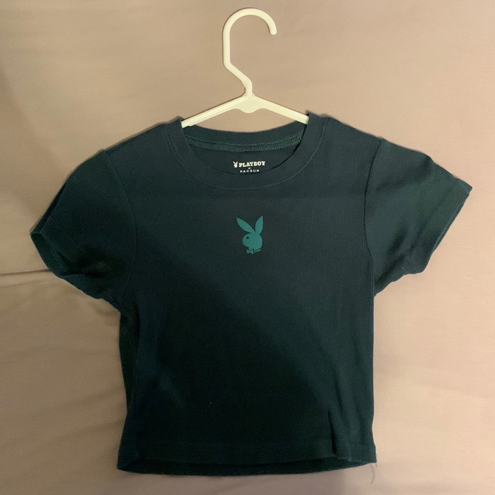 A dark green tight fitted crop top.